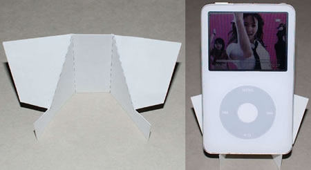 Make a simple iPhone  iPod stand stand from a standard business card.