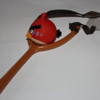 red Angry bird sling shot Launcher