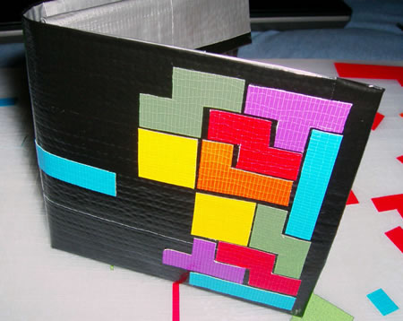 KMC Designs has now made a Tetris style version. The tetris duct tape wallet 