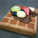 Waffle Bed with Syrup Sheets and Fruit Pillows