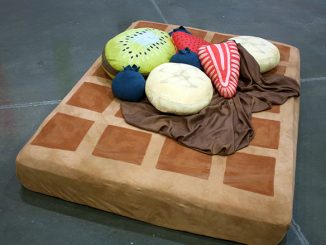 Waffle Bed with Syrup Sheets and Fruit Pillows